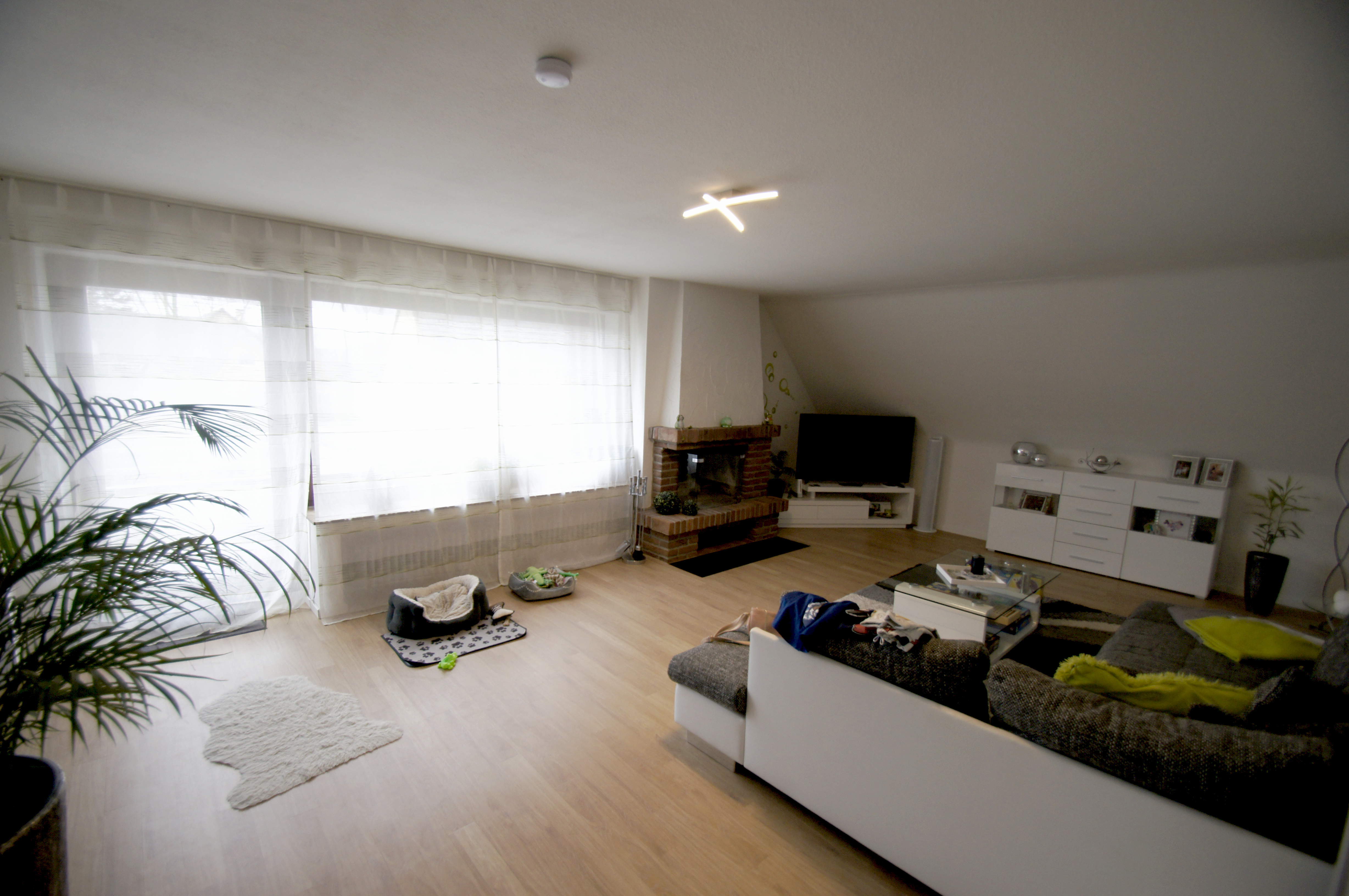 Ansicht 2 von: Vermietet! Helle u. moderne 3-Zim. Whg mit offenem Wohn-Essbereich, Kamin u. Südwestbalkon